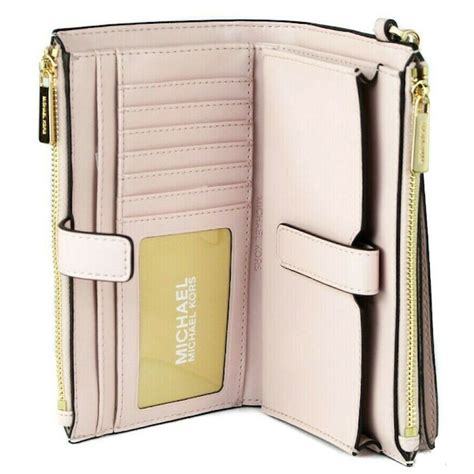 jet set travel michael kors wrislet wallet vanilla|michael kors travel continental wallet.